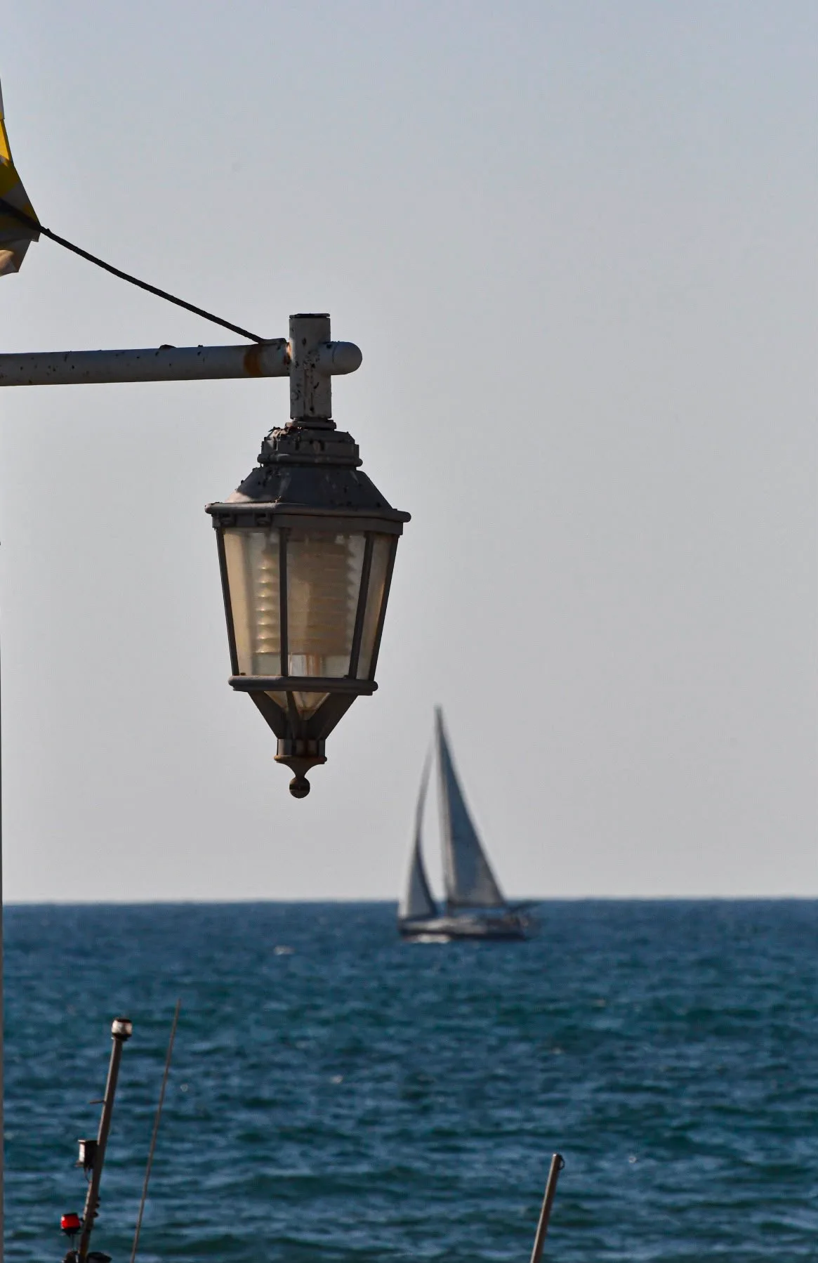 Lantern, one sail — photograph by Elad
